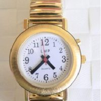 Montre parlante femme doree